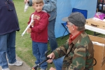 Baloney Kid gives instruction after the sale